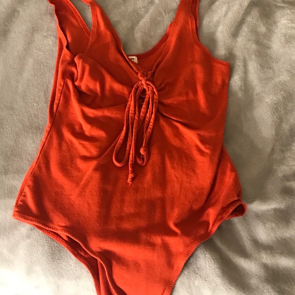 Bright orange tank top body suit!